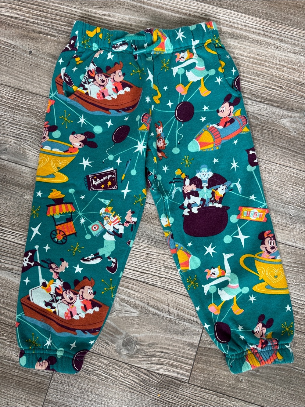 Disney Parks Teal Sweatpants with Multicolor Character Print